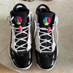 Stylish Black and White Sneakers with Pink and Blue Accents